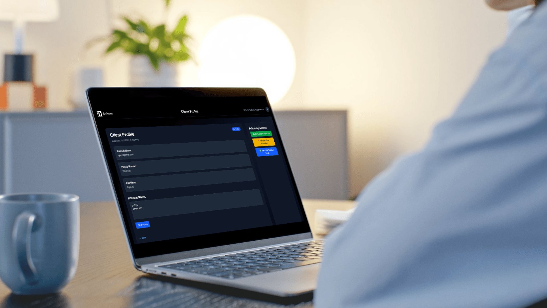 Arrivora Client Profile on Laptop